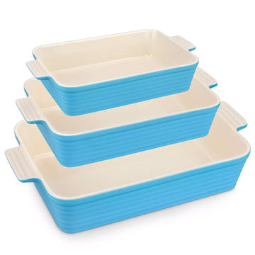 Three blue ribbed porcelain baking dishes with cream interiors