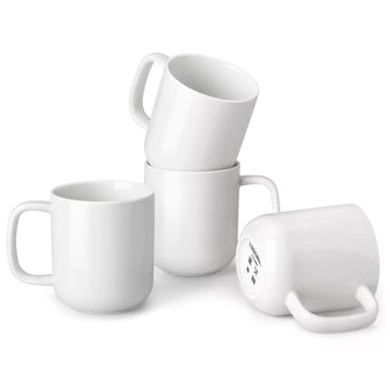 Set of white porcelain mugs on a white background#size_16oz
