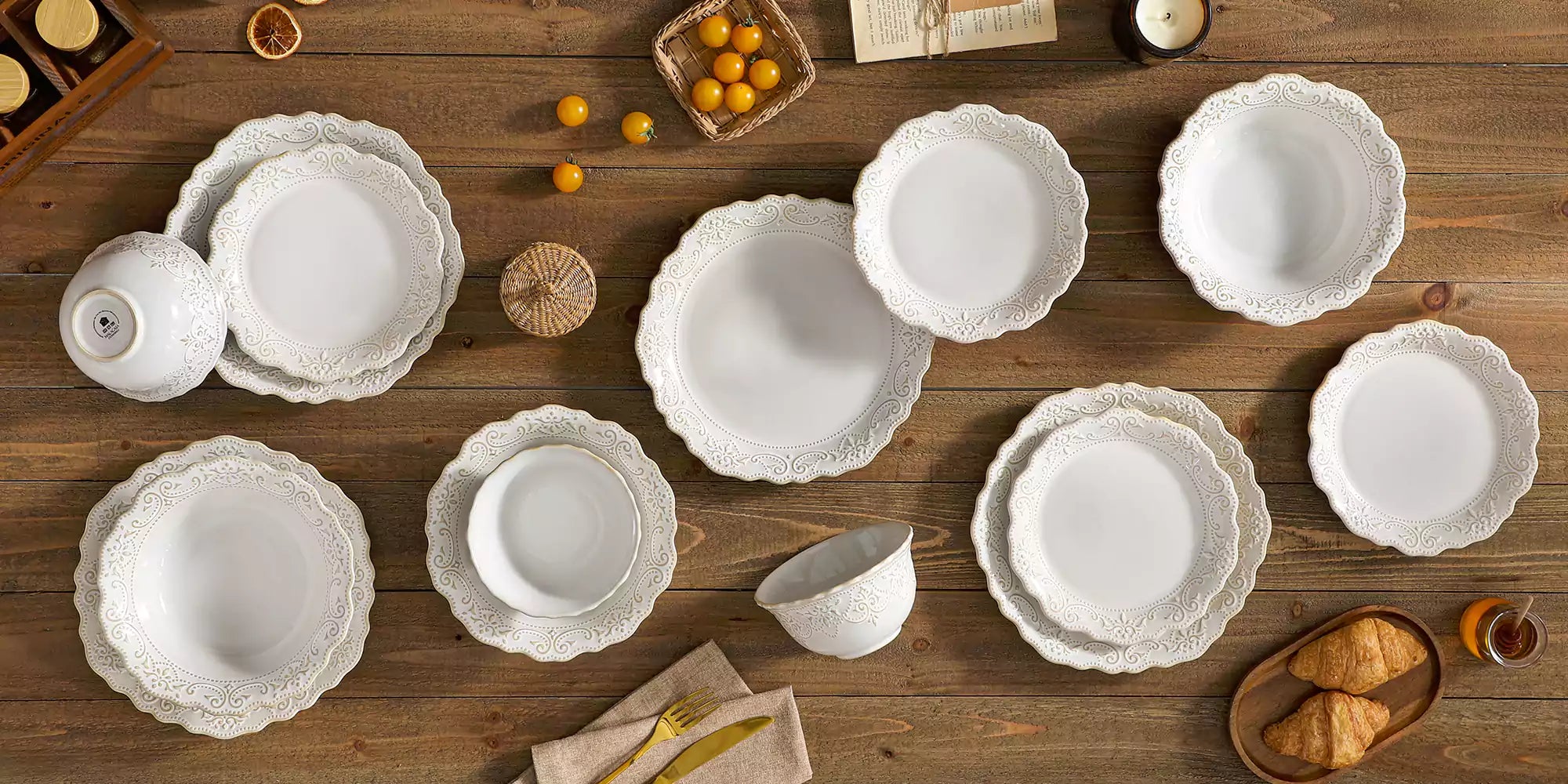 MALACASA Giselle white dinnerware set with lace detailing, styled on a rustic table.
